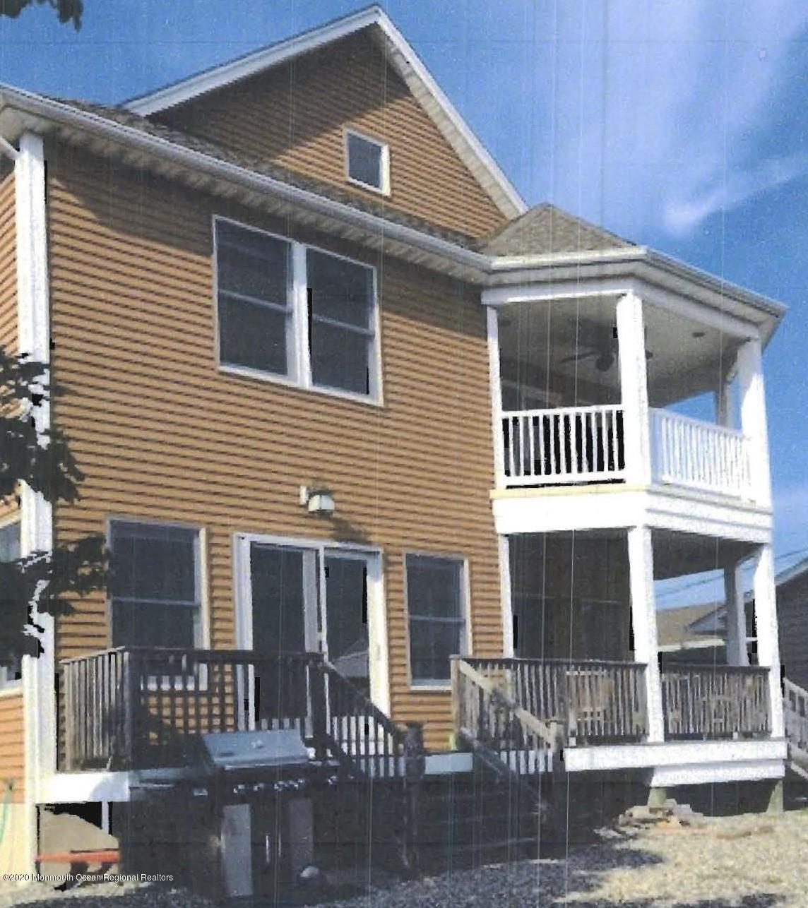 48 Topsail Road Brick, NJ 08723 - Photo 4 of 4 a front view of a house with a yard