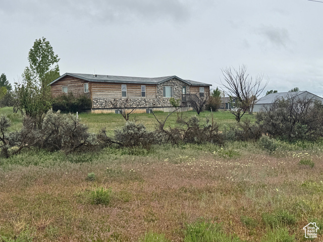 580 East 400 North Spring City, UT 84662 - Photo 5 of 40 View of front of property featuring stone siding