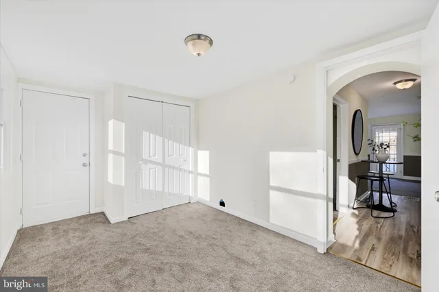 a view of livingroom with furniture and floor to ceiling window