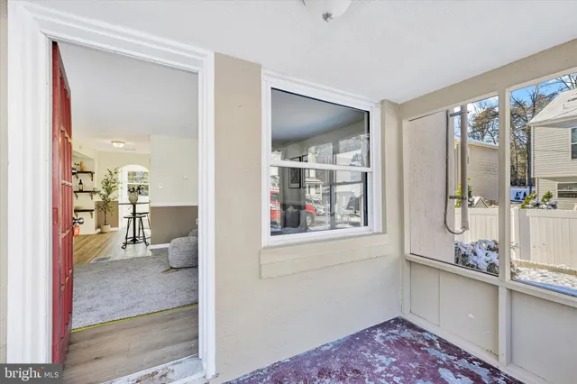a view of a living room and dining room