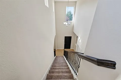 a view of a house with a garden