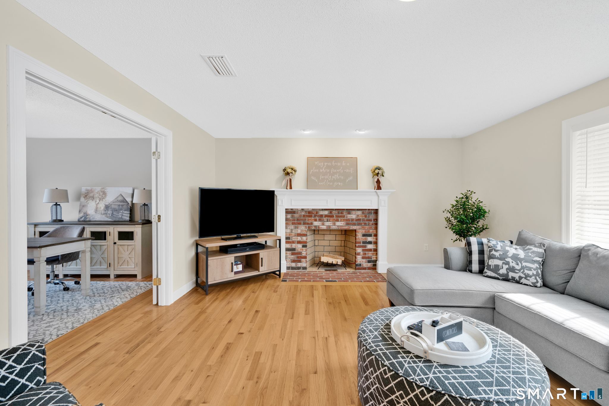 23 Neville Street Coventry, CT 06238 - Photo 13 of 40 a living room with furniture and a flat screen tv