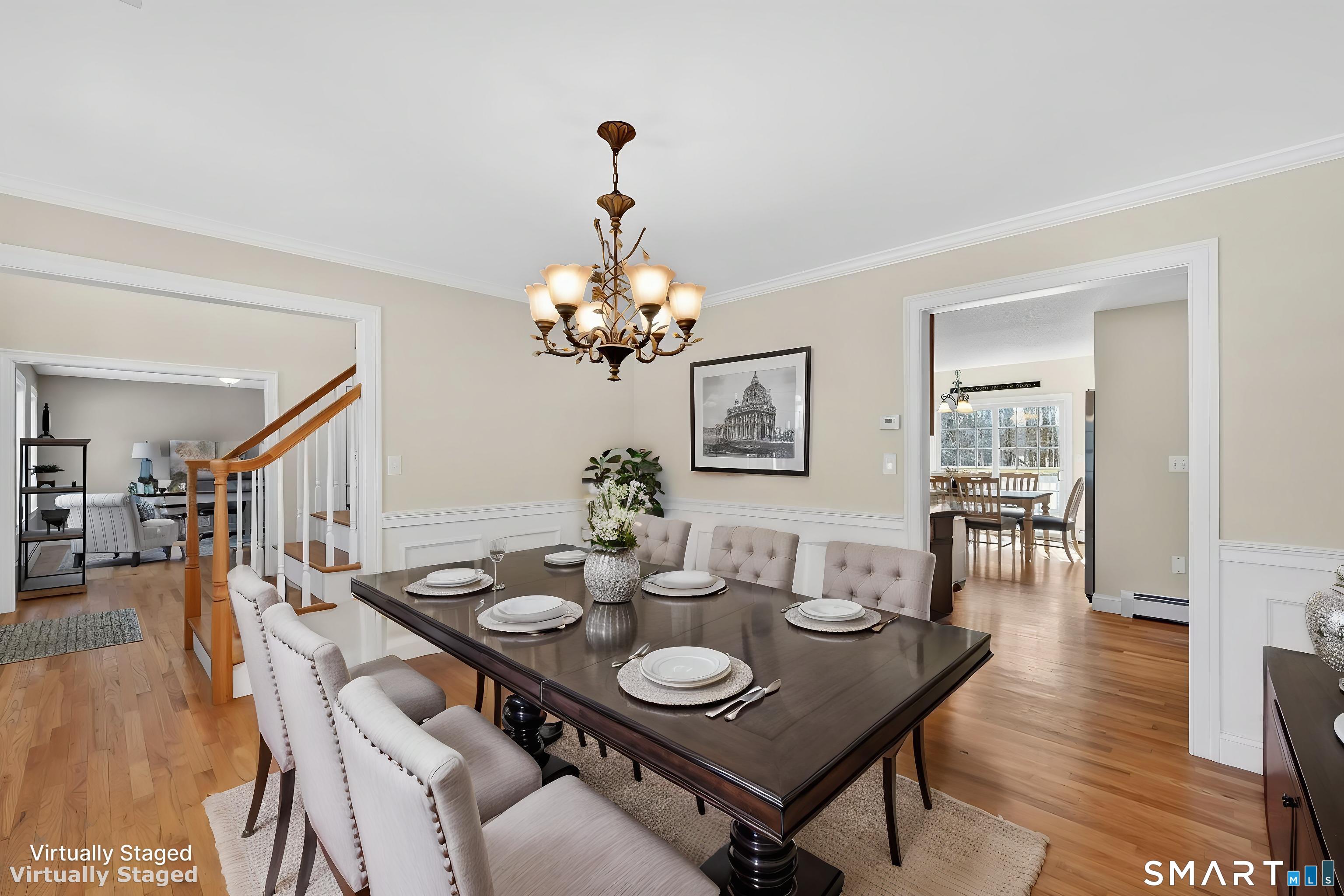 23 Neville Street Coventry, CT 06238 - Photo 16 of 40 a view of a dining room with furniture and wooden floor