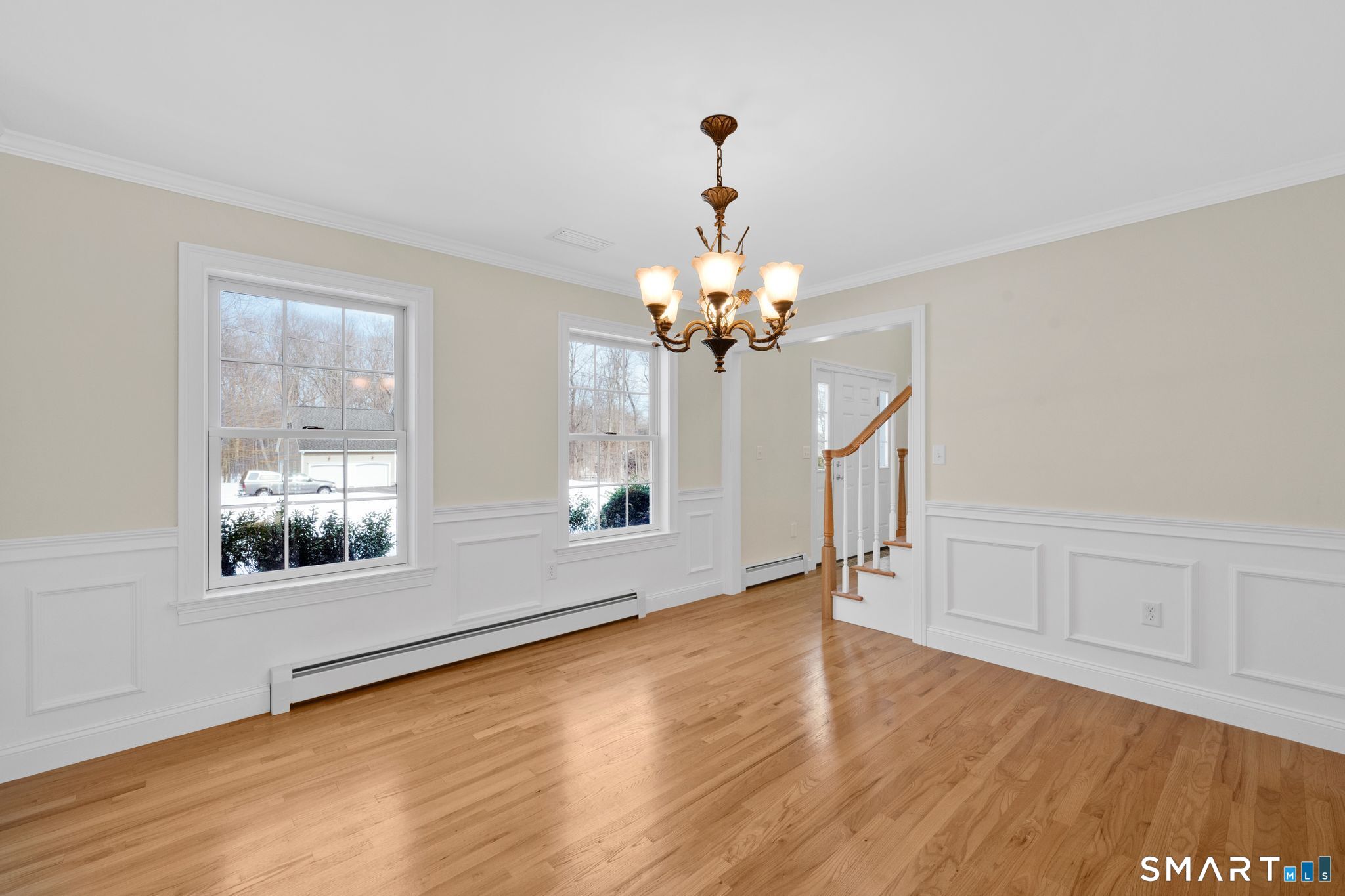 23 Neville Street Coventry, CT 06238 - Photo 17 of 40 a view of empty room with wooden floor and fan