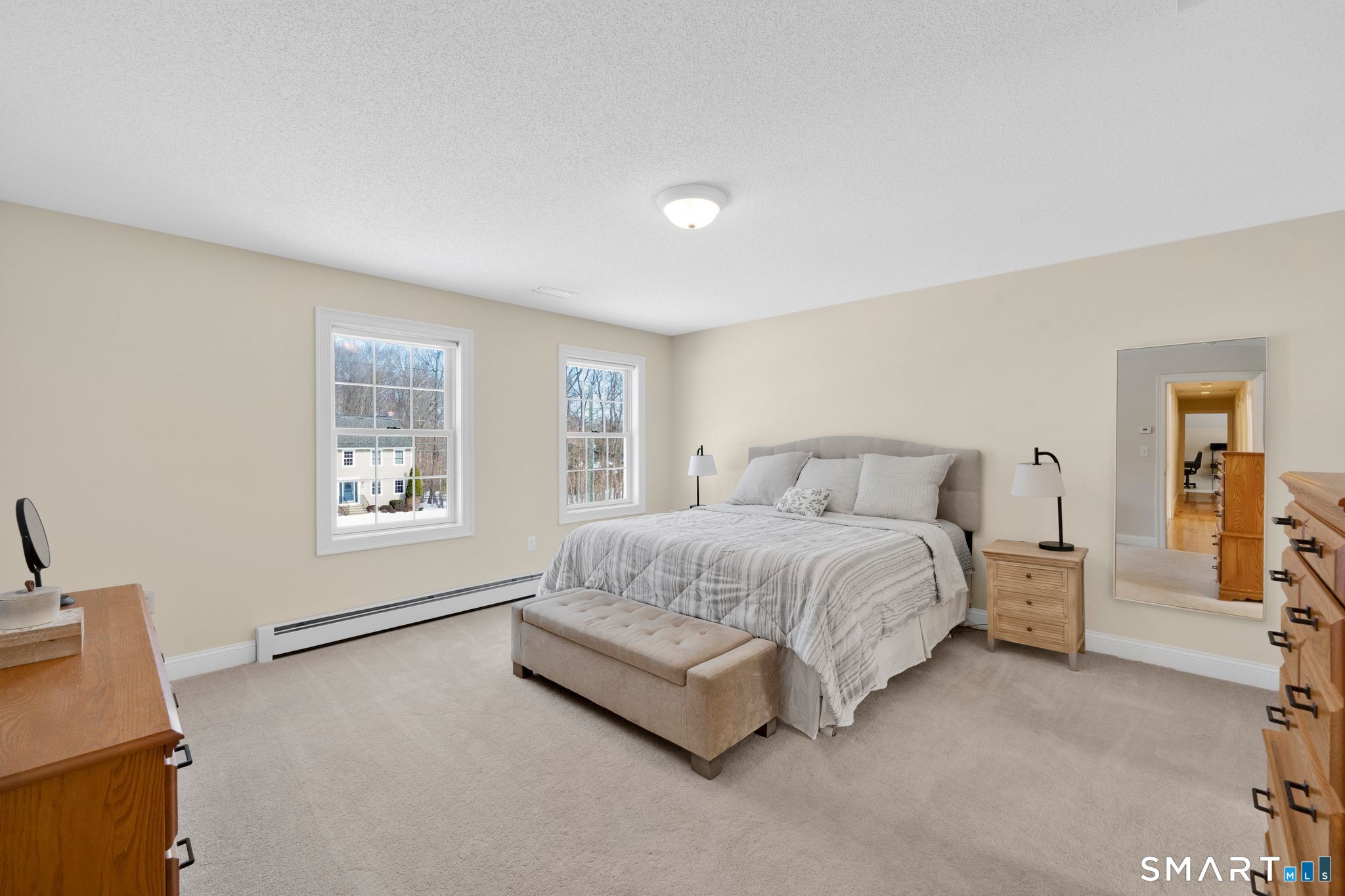 23 Neville Street Coventry, CT 06238 - Photo 24 of 40 a spacious bedroom with a bed and a window
