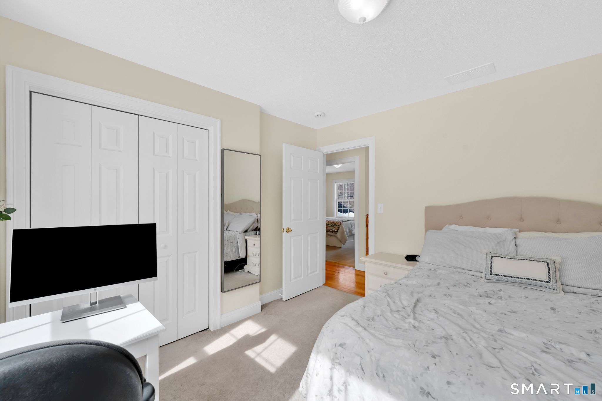 23 Neville Street Coventry, CT 06238 - Photo 32 of 40 a bedroom with a bed and a television