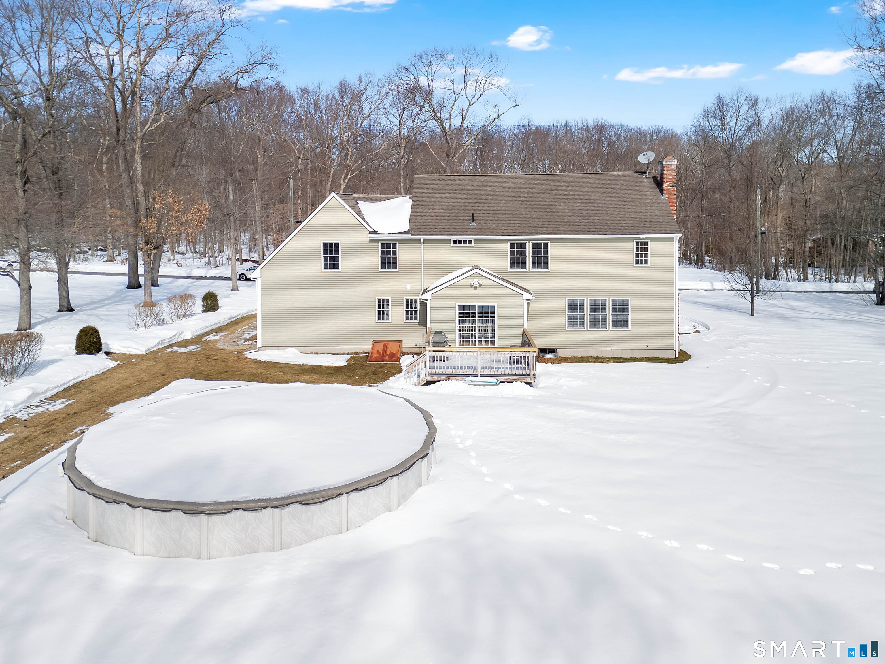 23 Neville Street Coventry, CT 06238 - Photo 37 of 40 a view of a house with a yard and snow