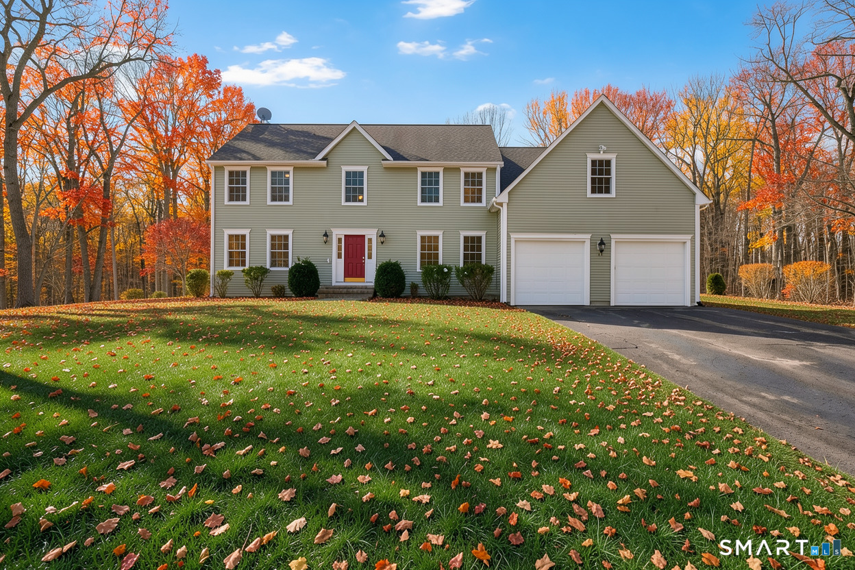 23 Neville Street Coventry, CT 06238 - Photo 40 of 40 a front view of a house with a yard