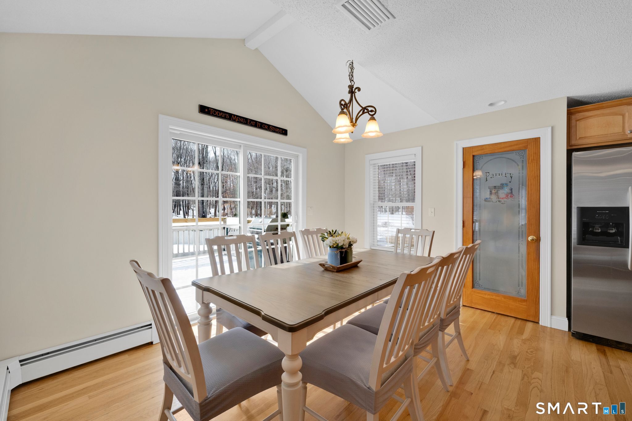 23 Neville Street Coventry, CT 06238 - Photo 6 of 40 a view of a dining room with furniture window and wooden floor