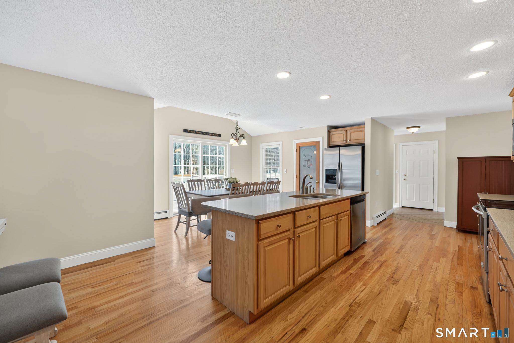 23 Neville Street Coventry, CT 06238 - Photo 8 of 40 a kitchen with a sink and wooden floor