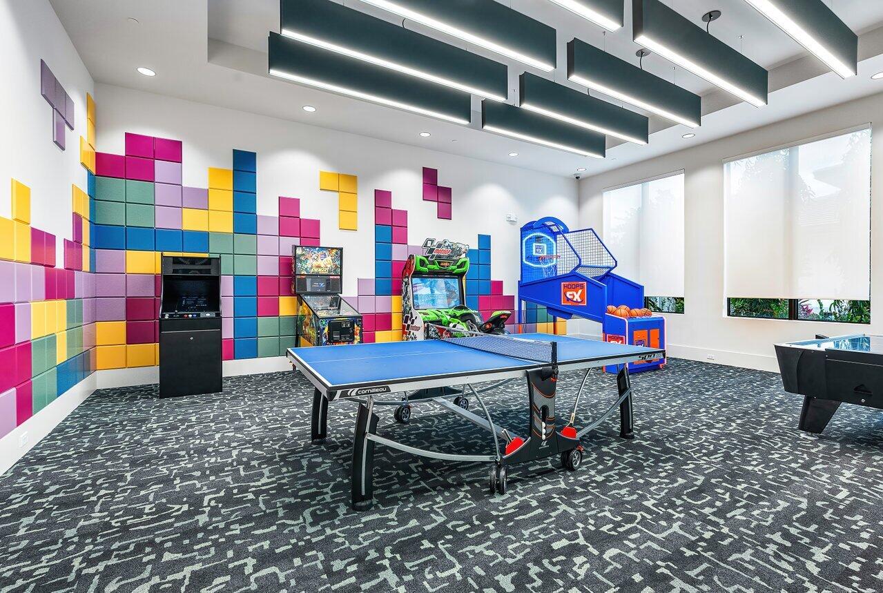 8260 Royal County Down Road Boca Raton, FL 33434 - Photo 106 of 115 a room with musical instruments and air hockey table