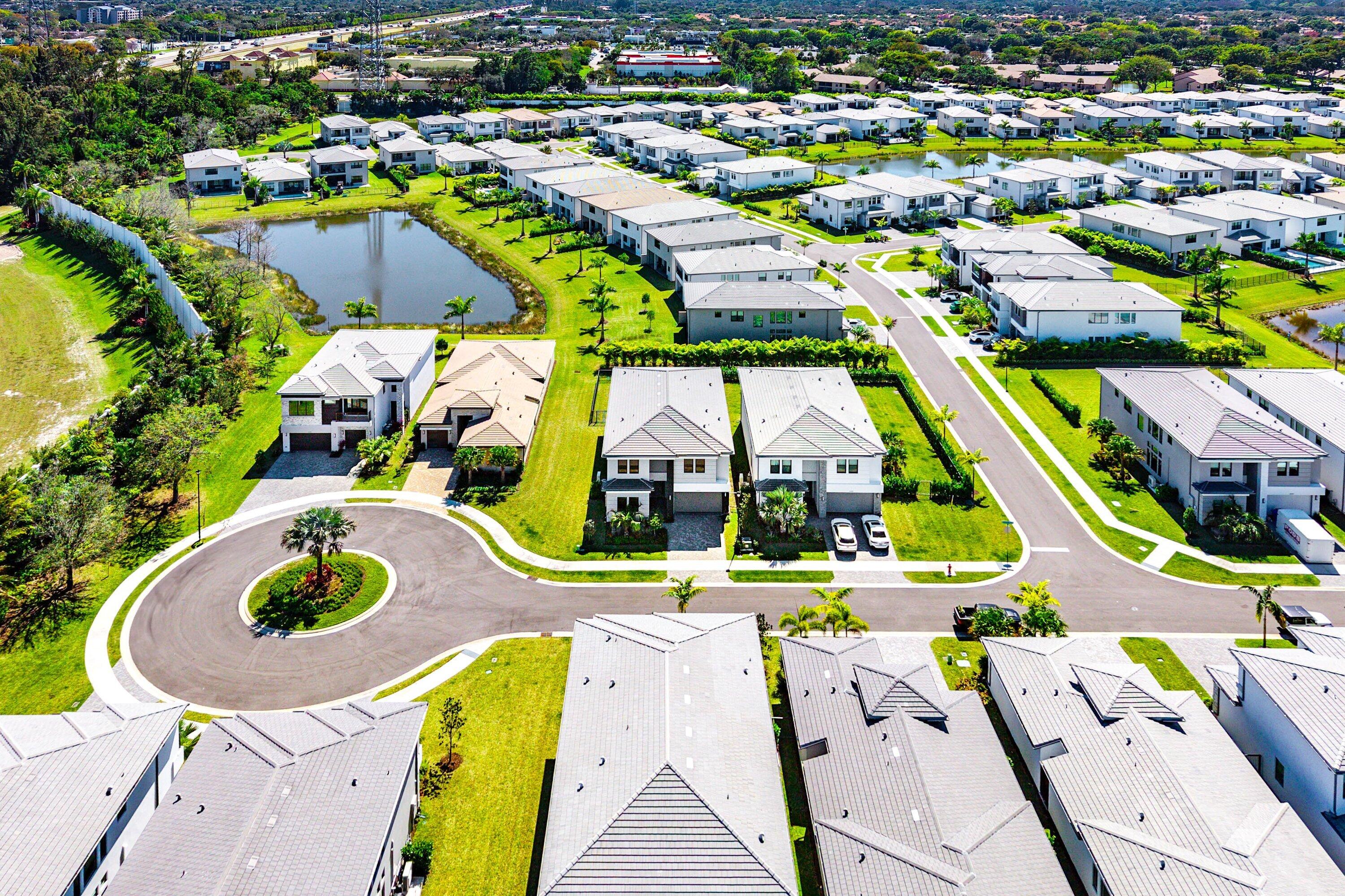 8260 Royal County Down Road Boca Raton, FL 33434 - Photo 71 of 115 an aerial view of a house with a swimming pool yard and outdoor seating