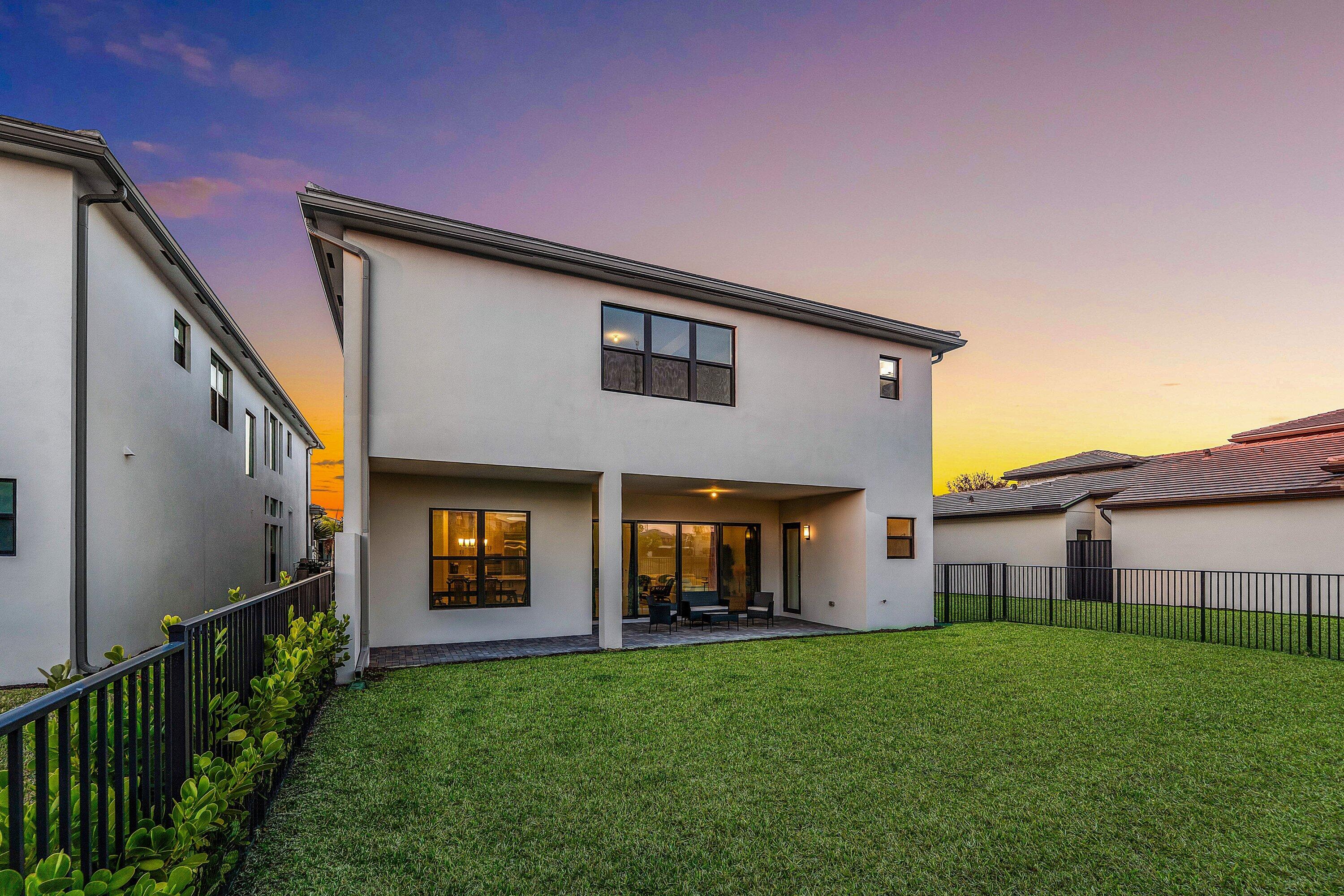 8260 Royal County Down Road Boca Raton, FL 33434 - Photo 80 of 115 a view of a yard in front of a house