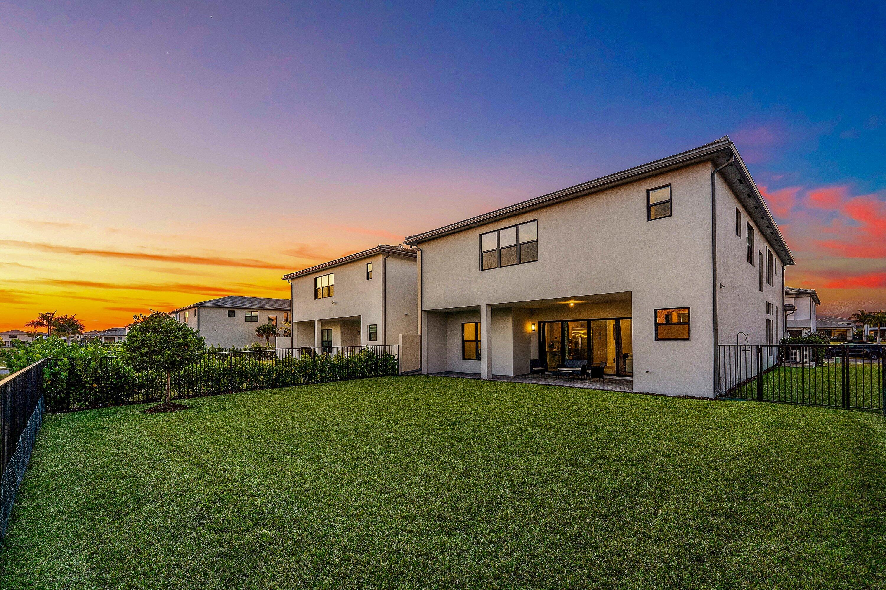 8260 Royal County Down Road Boca Raton, FL 33434 - Photo 82 of 115 a front view of house with yard and green space