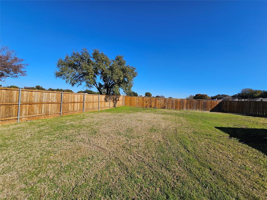 2400 Meadow Creek Drive Carrollton, TX 75006 - Photo 33 of 33 a view of an outdoor space and a yard