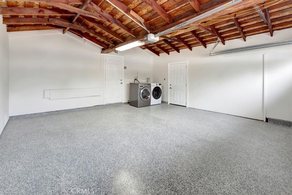 363 Ravello Lane Costa Mesa, CA 92627 - Photo 15 of 22 a view of a room with gym equipment