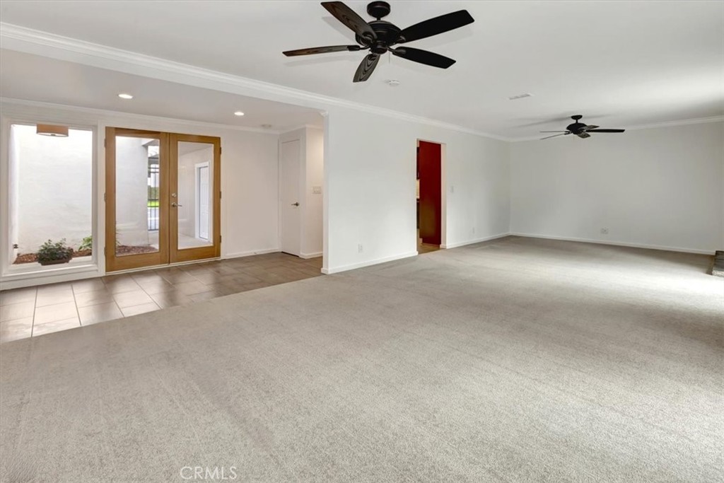 363 Ravello Lane Costa Mesa, CA 92627 - Photo 4 of 22 a view of an empty room with a window