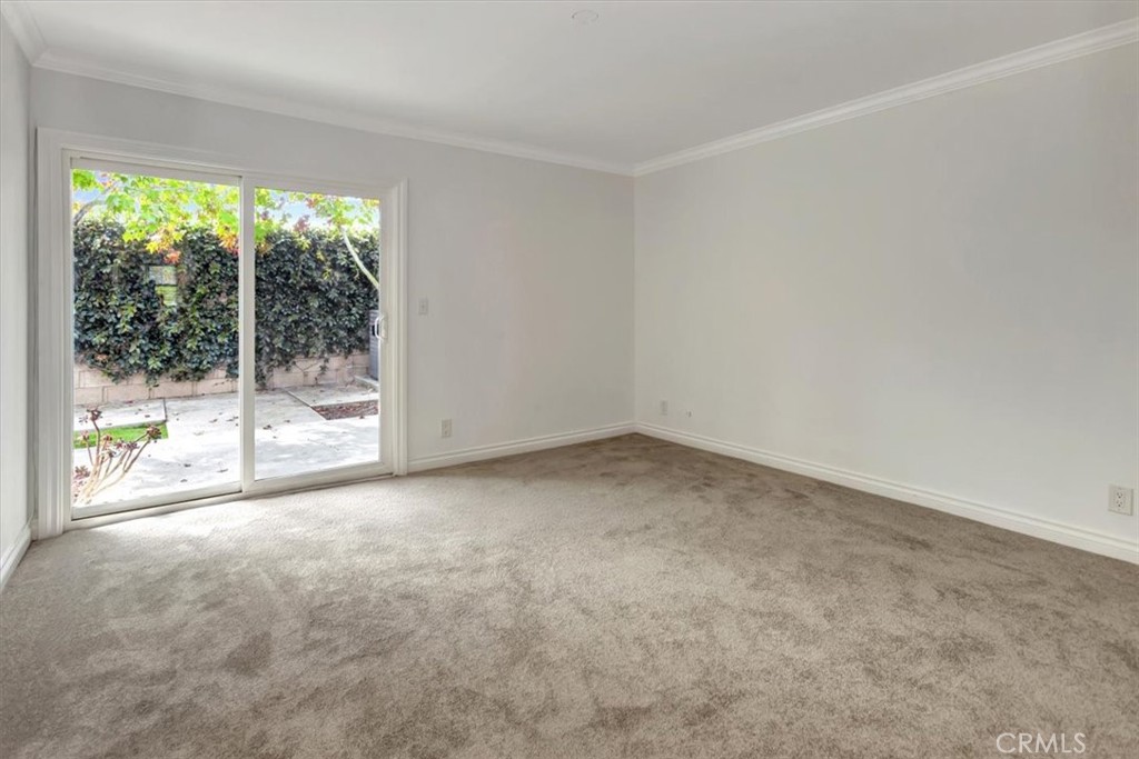 363 Ravello Lane Costa Mesa, CA 92627 - Photo 10 of 22 a view of a room with a large window