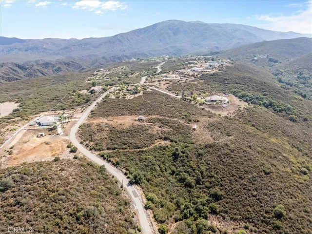 a view of a city with mountains in the background