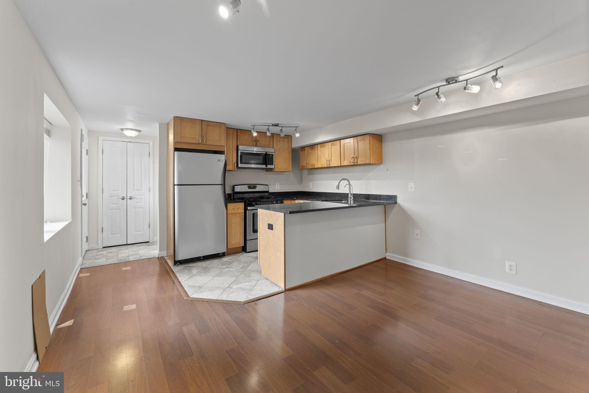 2812 Adams Mill Road Northwest Washington, DC 20009 - Photo 34 of 45 Lower Level Kitchen & Living Area