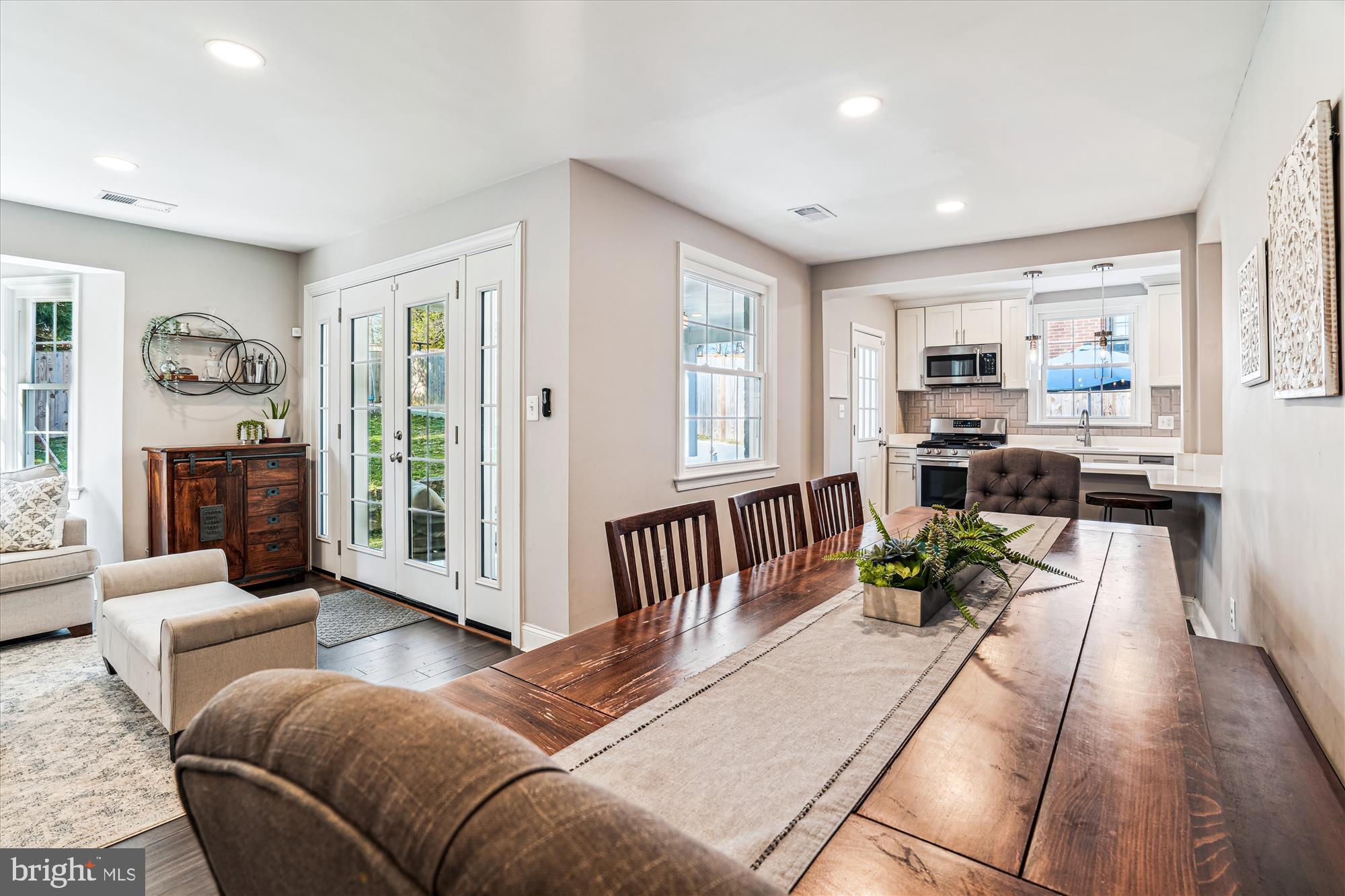 10206 Sutherland Road Silver Spring, MD 20901 - Photo 13 of 74 Dining Area extends from living room to kitchen