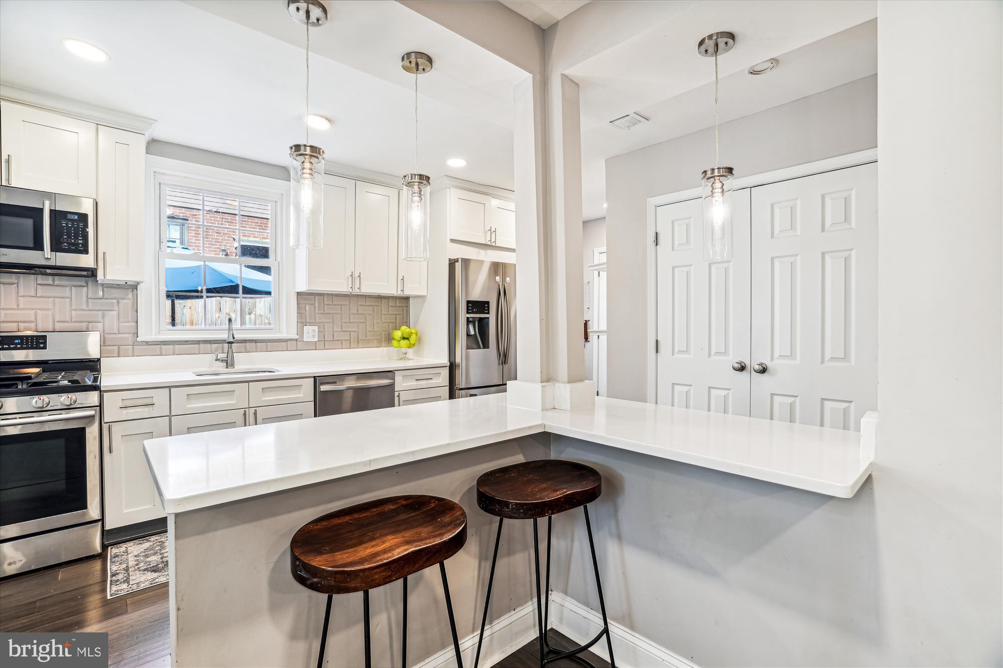 10206 Sutherland Road Silver Spring, MD 20901 - Photo 14 of 74 Eat in kitchen countertops add space + elegance