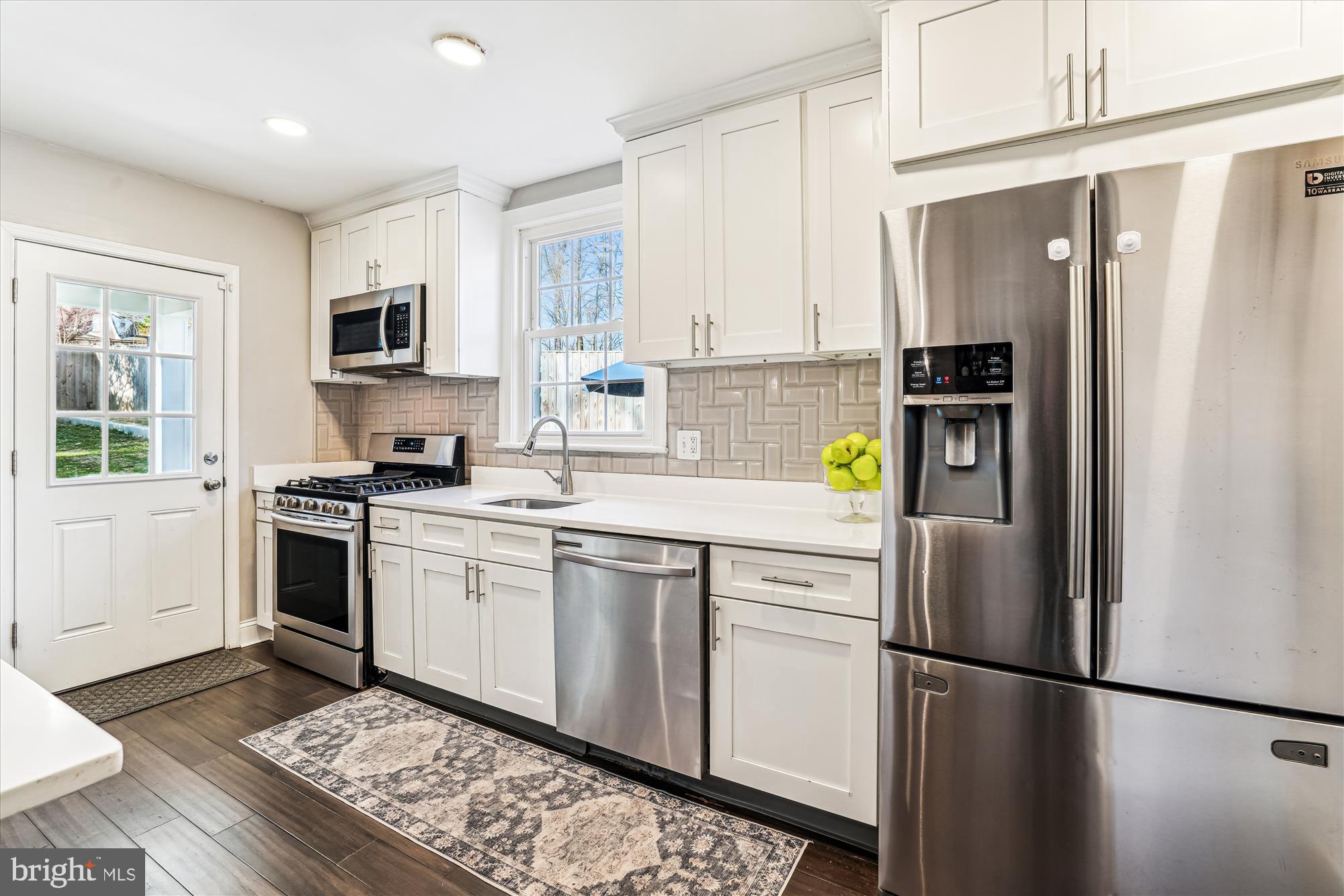 10206 Sutherland Road Silver Spring, MD 20901 - Photo 15 of 74 Kitchen w/ full suite of stainless steel appliance