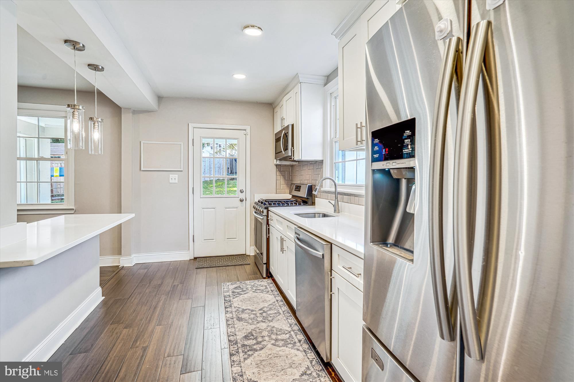 10206 Sutherland Road Silver Spring, MD 20901 - Photo 16 of 74 Kitchen door leading to patio adds great flow