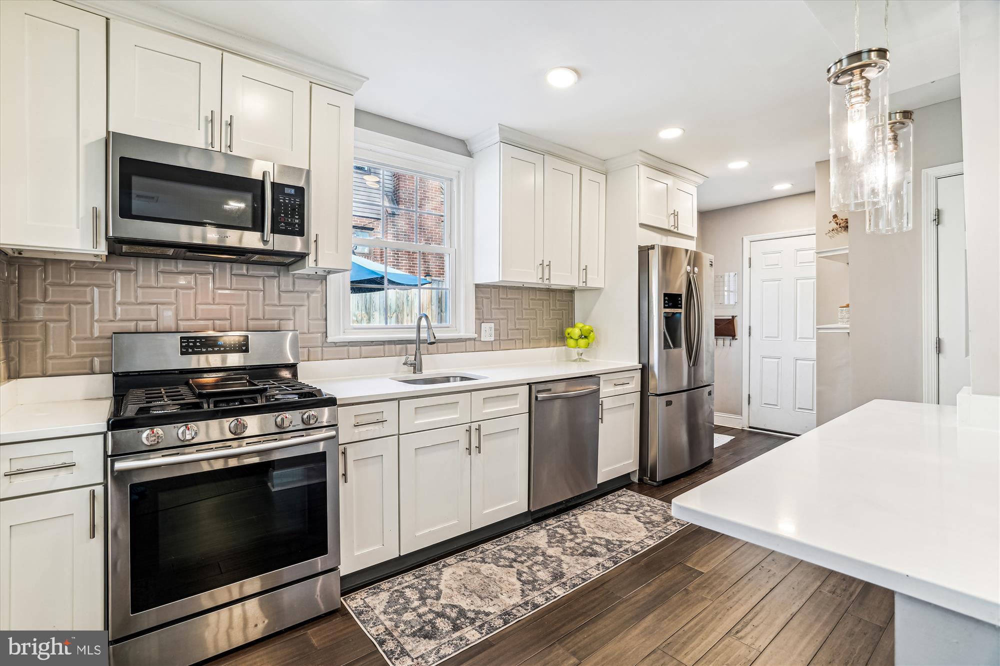 10206 Sutherland Road Silver Spring, MD 20901 - Photo 17 of 74 Kitchen leads to garage door and