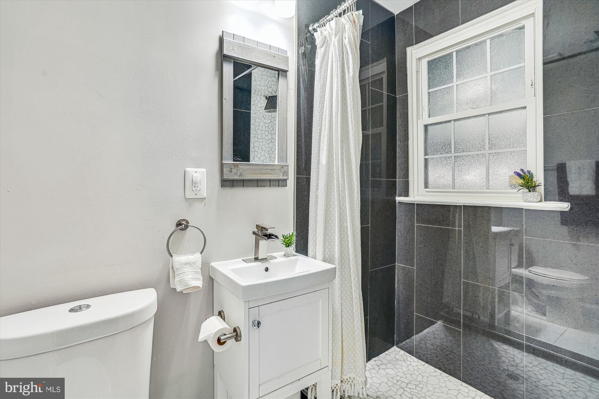 10206 Sutherland Road Silver Spring, MD 20901 - Photo 27 of 74 Full Bath #2
En suite to Bedroom 3