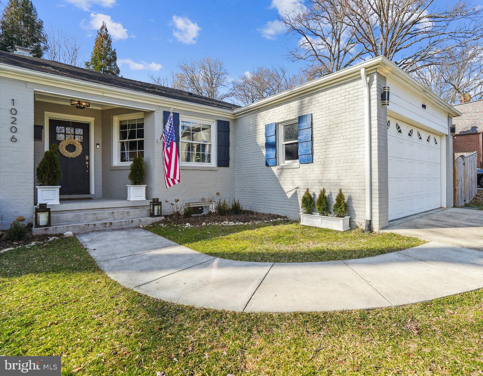 10206 Sutherland Road Silver Spring, MD 20901 - Photo 4 of 74 2 car garage with ample storage + driveway parking