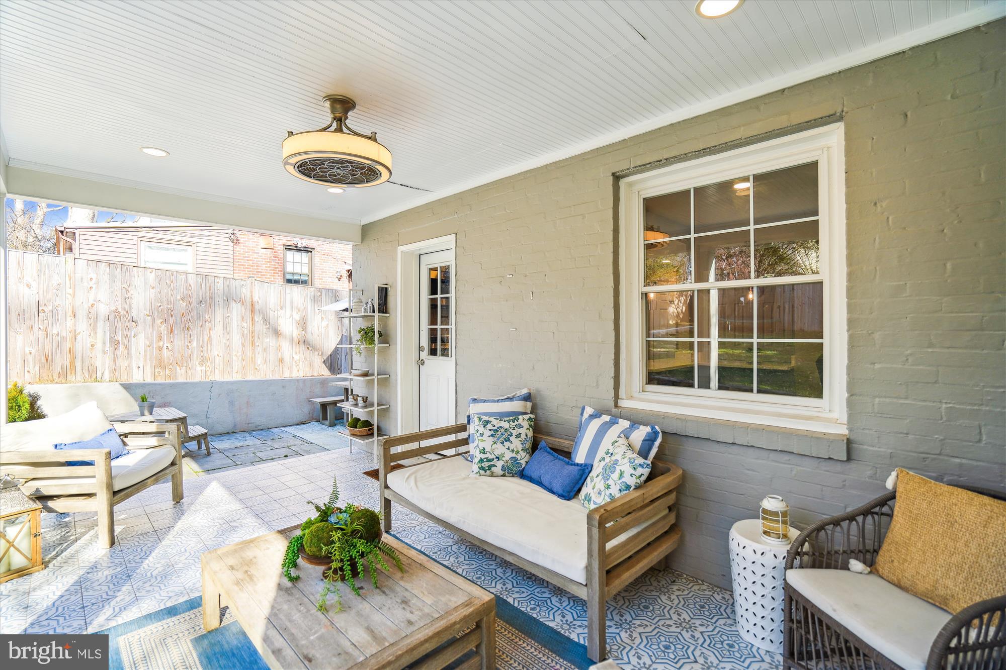 10206 Sutherland Road Silver Spring, MD 20901 - Photo 43 of 74 Patio has fan, lights, built in shelving!