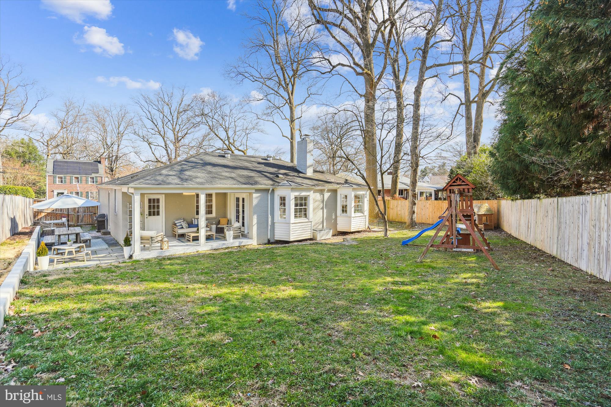 10206 Sutherland Road Silver Spring, MD 20901 - Photo 49 of 74 View of the grassy backyard & outdoor living space
