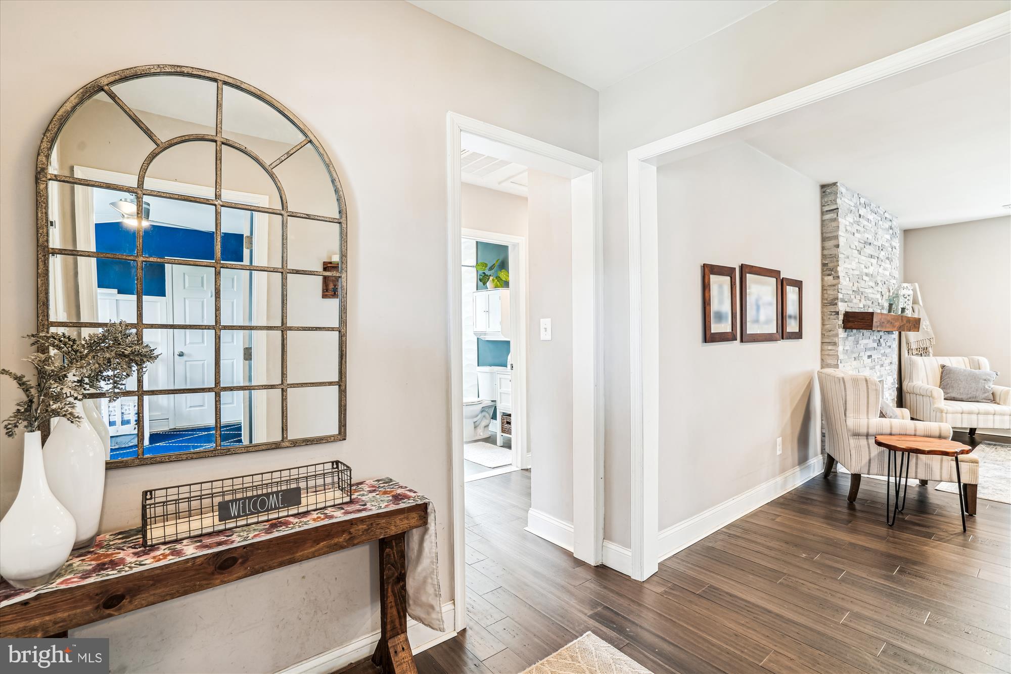 10206 Sutherland Road Silver Spring, MD 20901 - Photo 7 of 74 Foyer leads to living room w/ hardwoods throughout