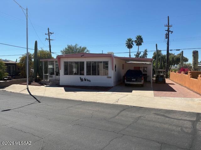 5731 West Flying M Street Tucson, AZ 85713 - Photo 3 of 20 a view of a house with a patio