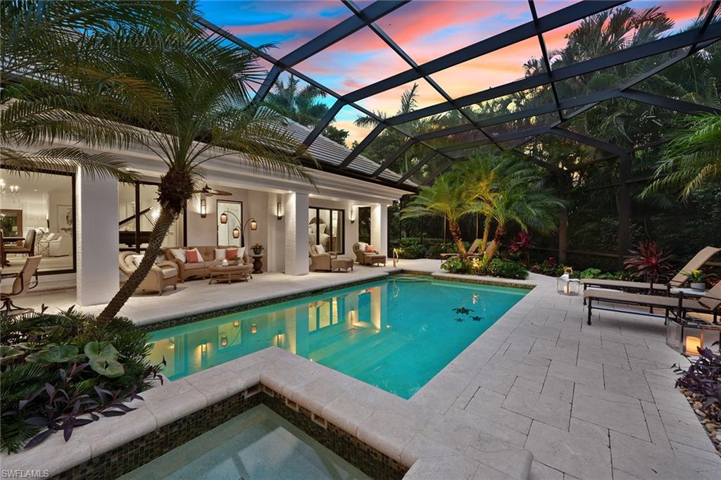 a view of a swimming pool with a patio