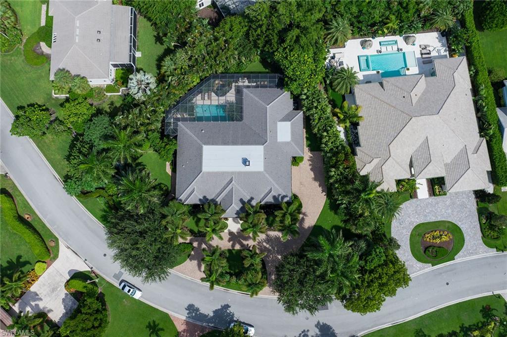 809 Buttonbush Lane Naples, FL 34108 - Photo 12 of 23 an aerial view of a house with a garden