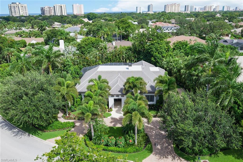 809 Buttonbush Lane Naples, FL 34108 - Photo 22 of 23 an aerial view of a house with a yard