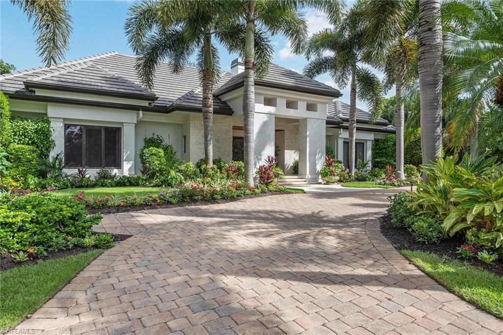 809 Buttonbush Lane Naples, FL 34108 - Photo 23 of 23 front view of a house with a small yard