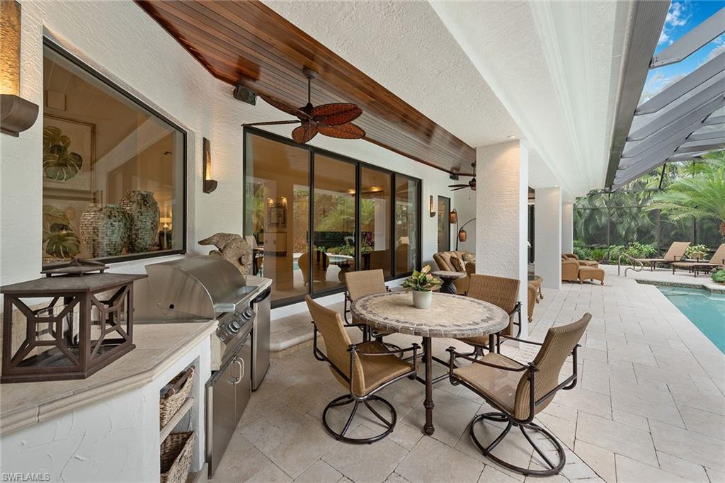 809 Buttonbush Lane Naples, FL 34108 - Photo 9 of 23 a view of an outdoor space with seating area