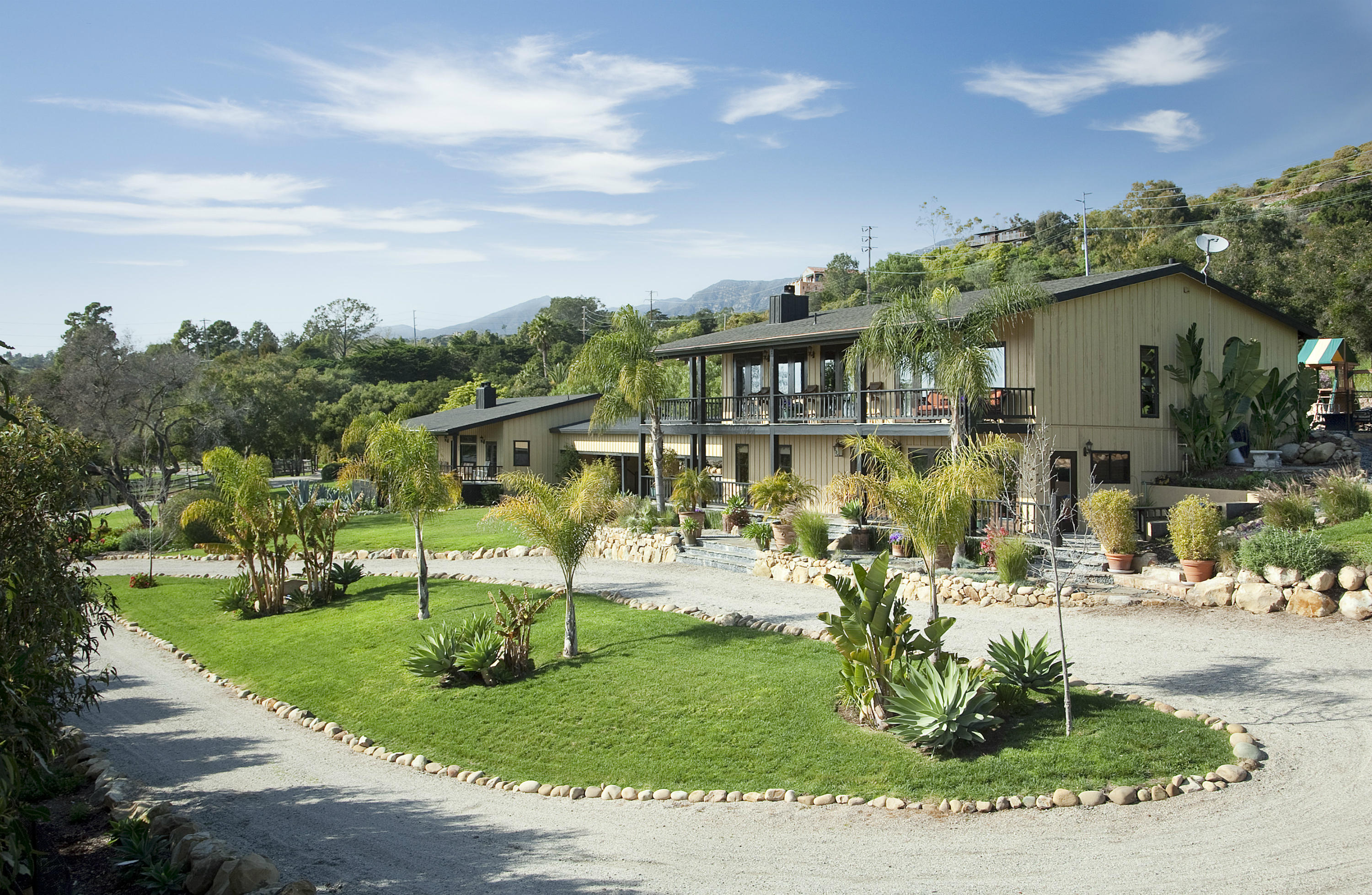 340 Toro Canyon Road Carpinteria, CA 93013 - Photo 11 of 14 a view of a house with a patio