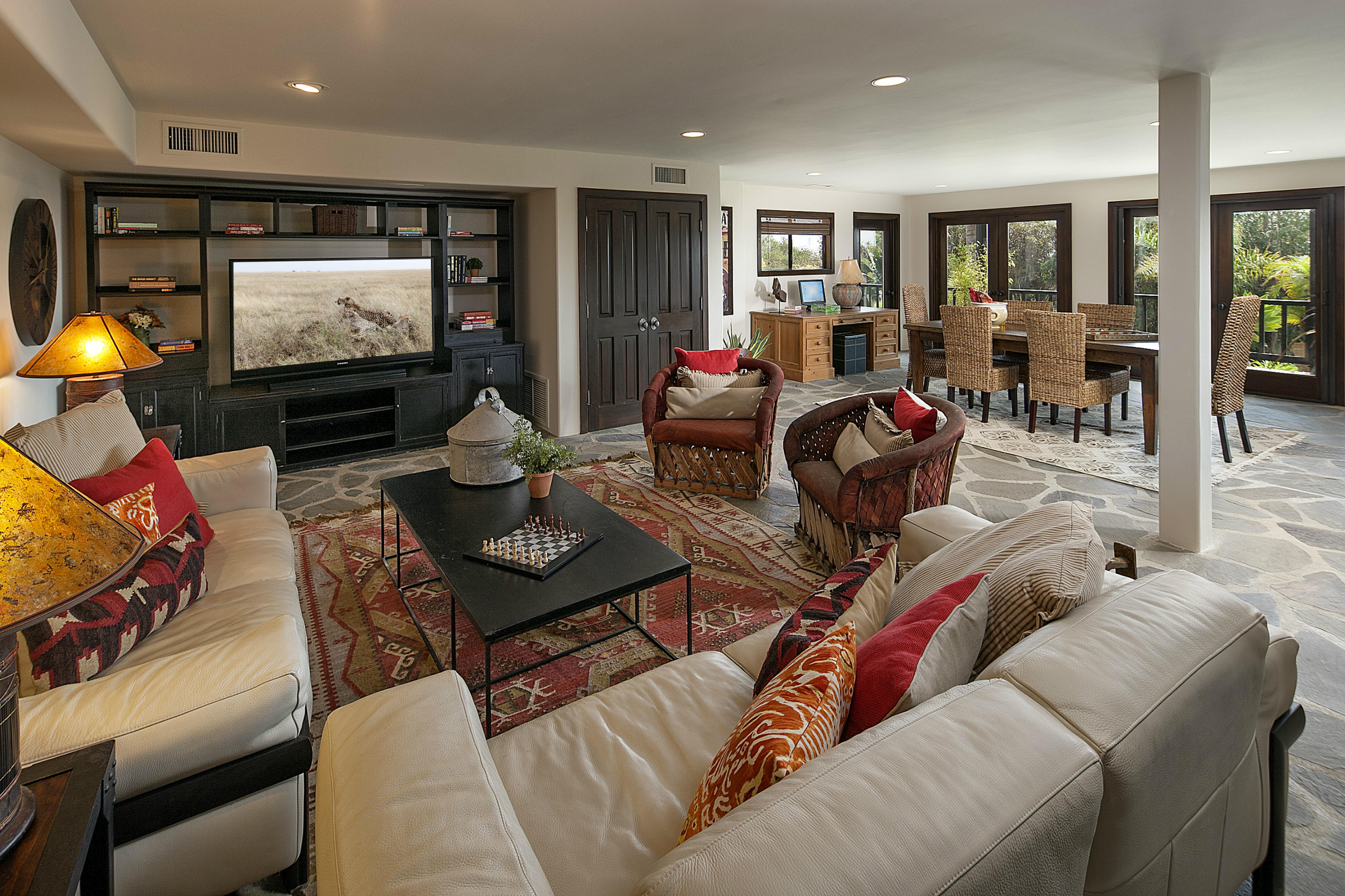 340 Toro Canyon Road Carpinteria, CA 93013 - Photo 6 of 14 a living room with furniture and a flat screen tv