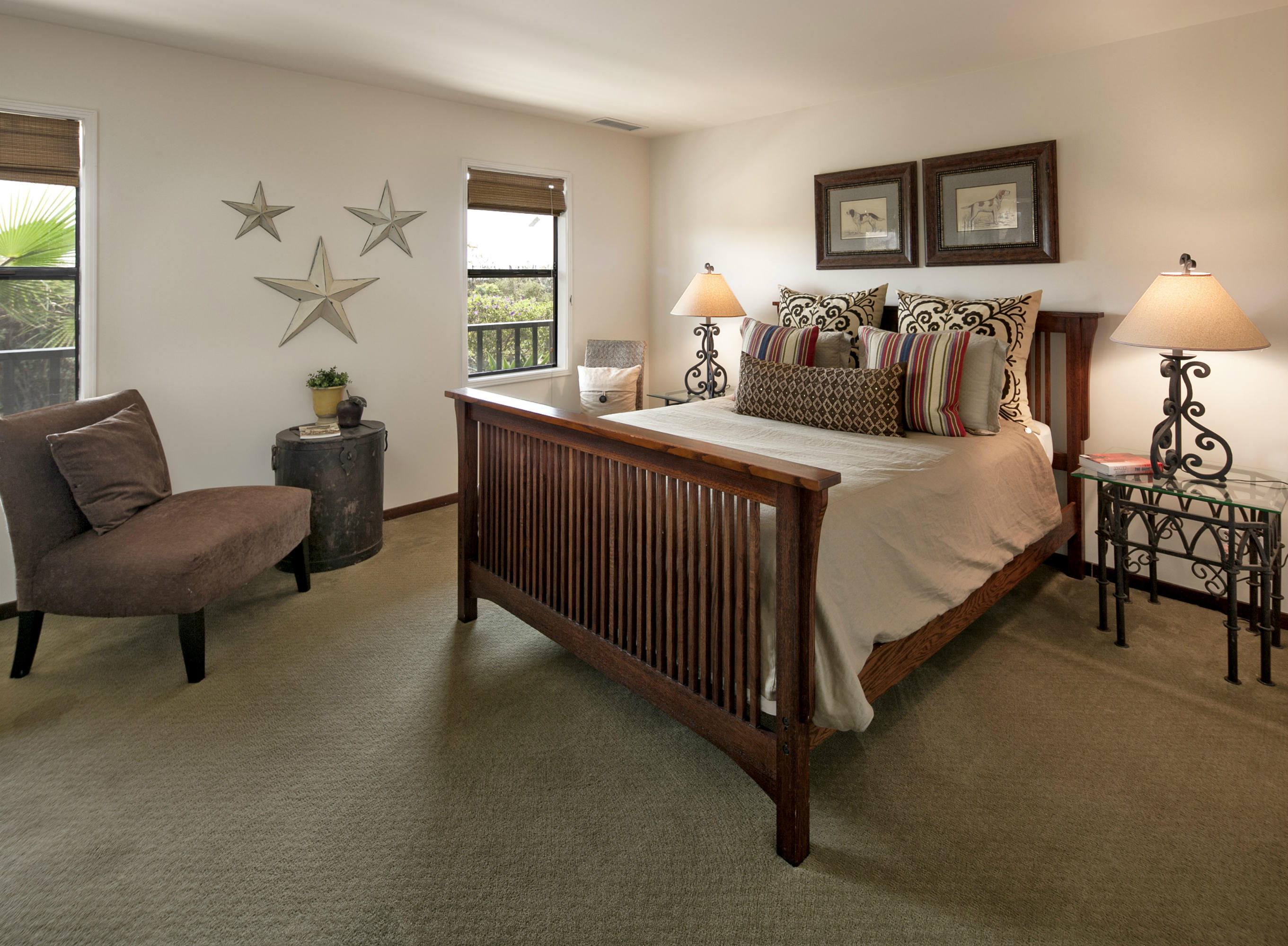 340 Toro Canyon Road Carpinteria, CA 93013 - Photo 7 of 14 a bedroom with a bed and a couch