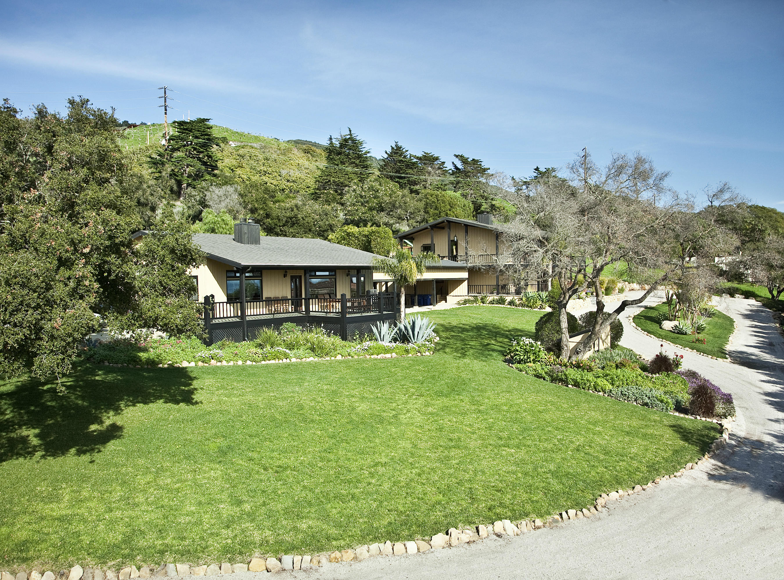 340 Toro Canyon Road Carpinteria, CA 93013 - Photo 10 of 14 a view of a house with a backyard
