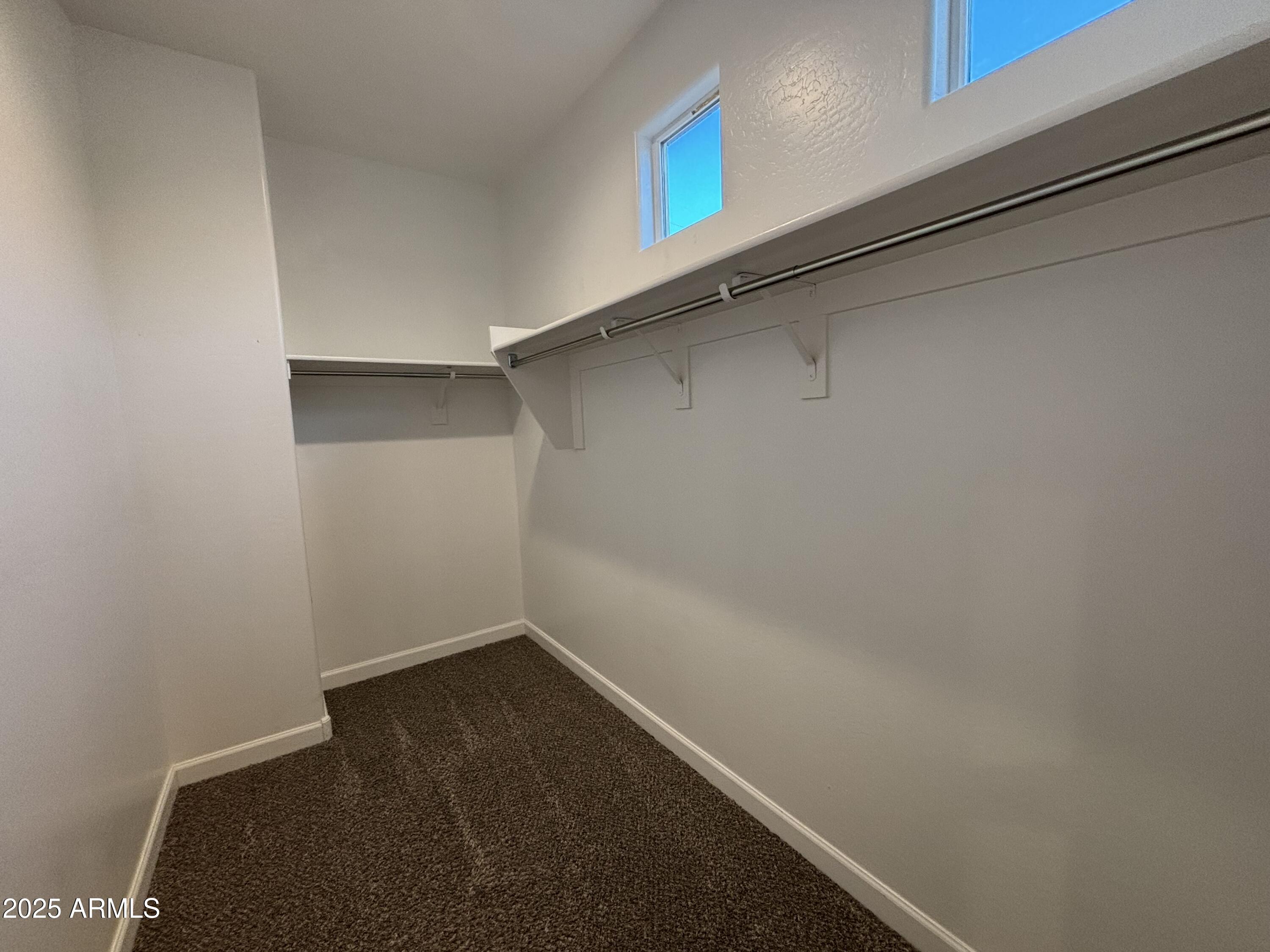 1255 North Arizona Avenue, Unit 1124 Chandler, AZ 85225 - Photo 12 of 29 a room that has a window in it