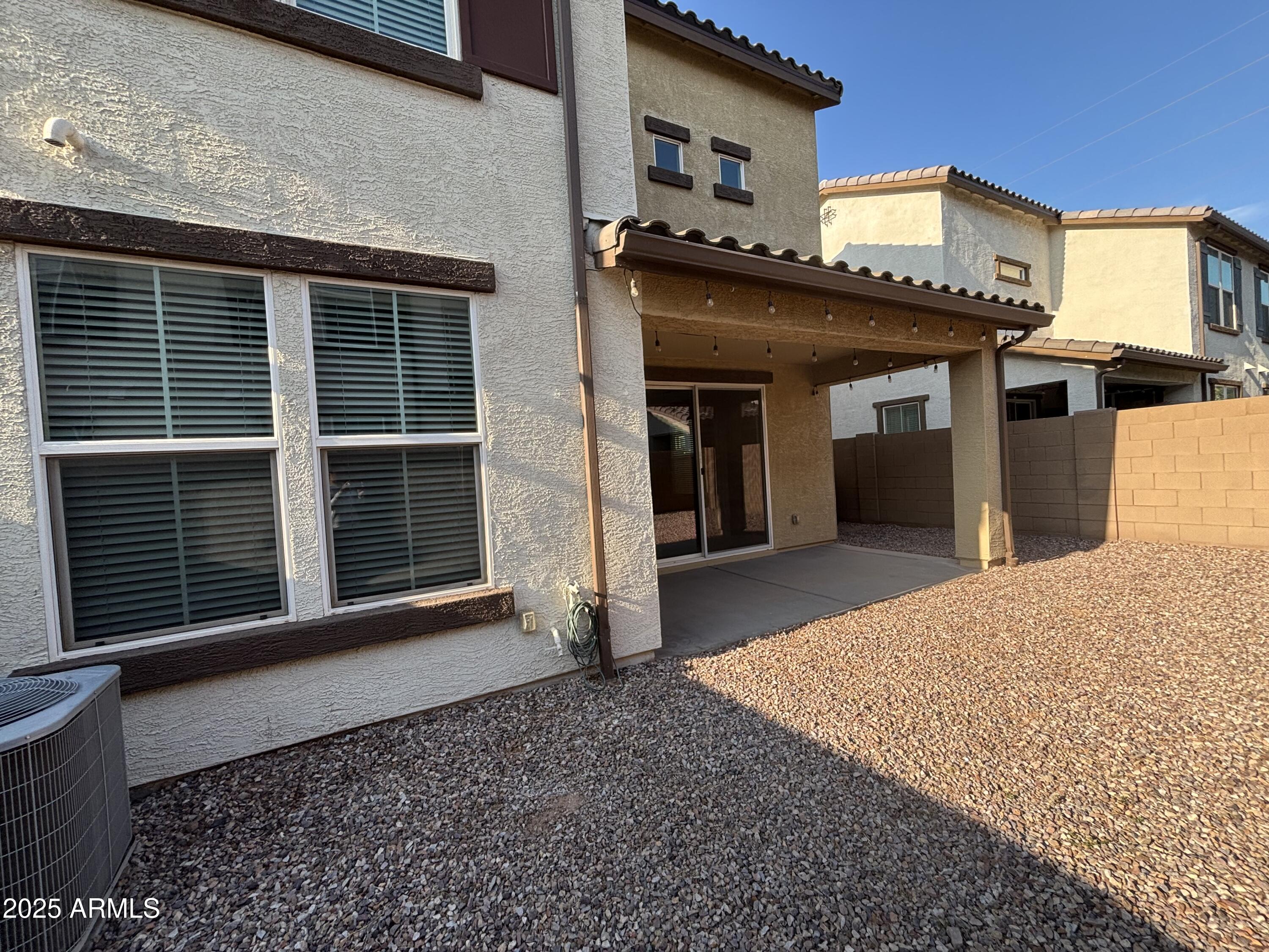 1255 North Arizona Avenue, Unit 1124 Chandler, AZ 85225 - Photo 27 of 29 a front view of a house with a large window