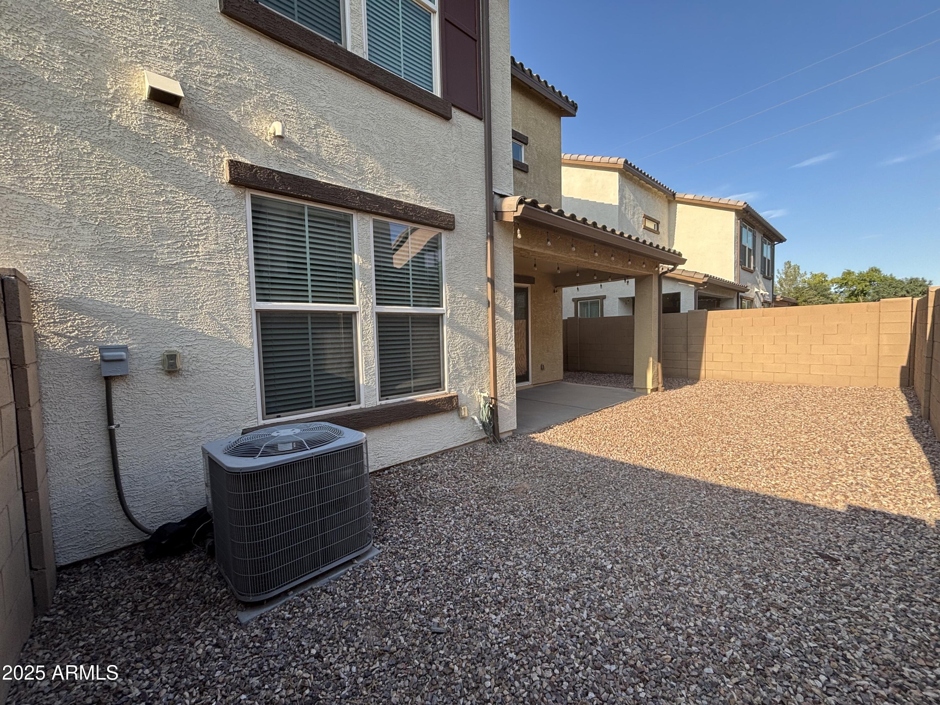 1255 North Arizona Avenue, Unit 1124 Chandler, AZ 85225 - Photo 29 of 29 a spacious bathroom with a granite countertop sink and a mirror