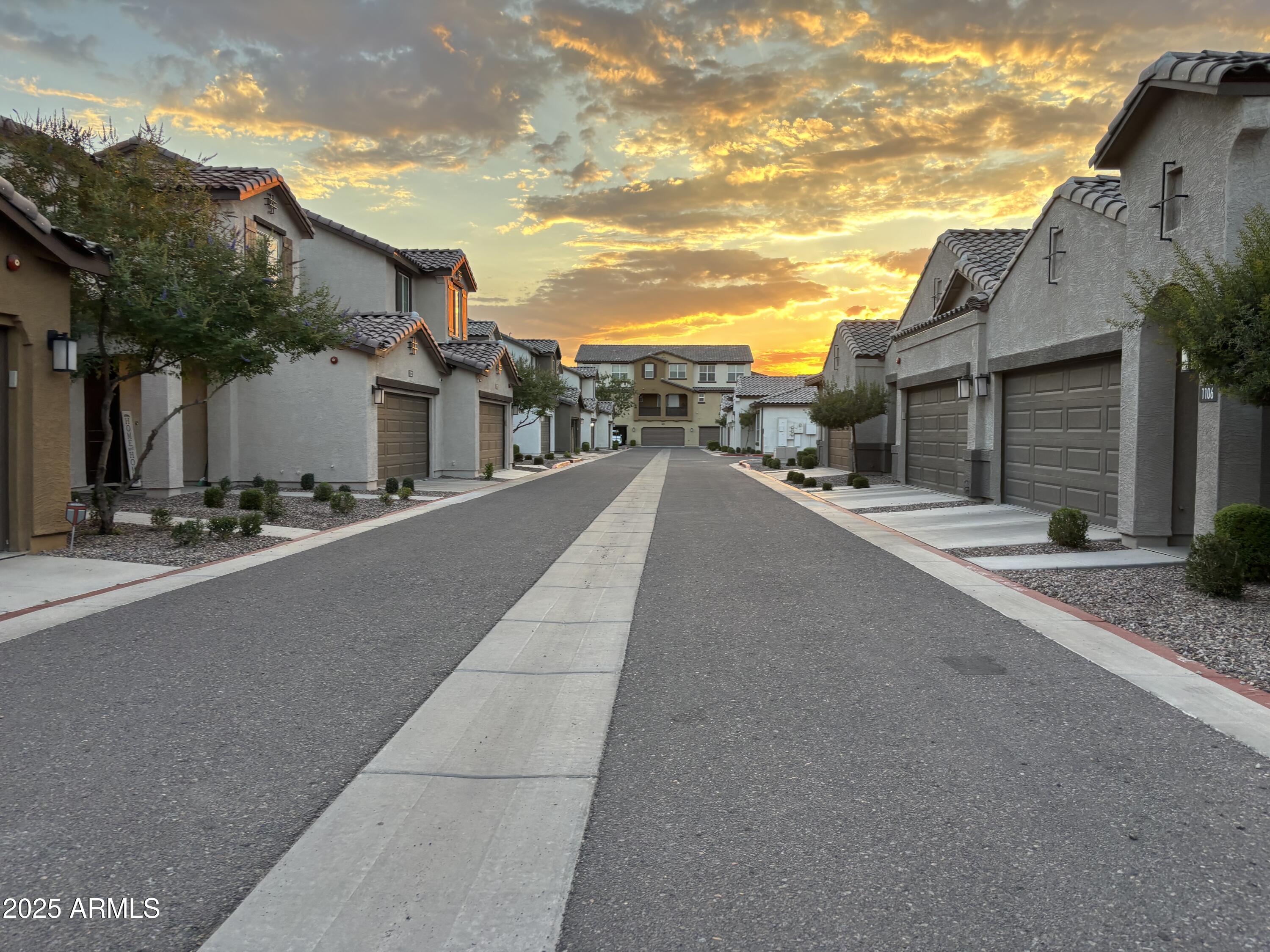 1255 North Arizona Avenue, Unit 1124 Chandler, AZ 85225 - Photo 3 of 29 a city street lined with tall buildings