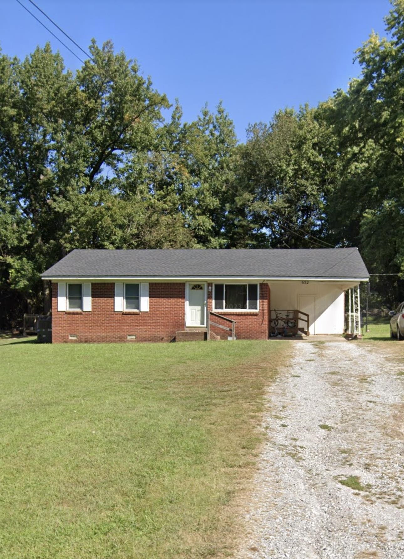 652 Skyline Drive Ripley, TN 38063 - Photo 1 of 11 Ranch-style home with a front lawn and a carport