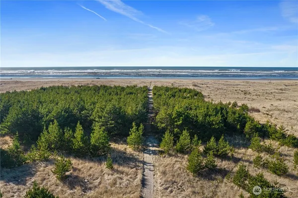 a yard with a ocean view